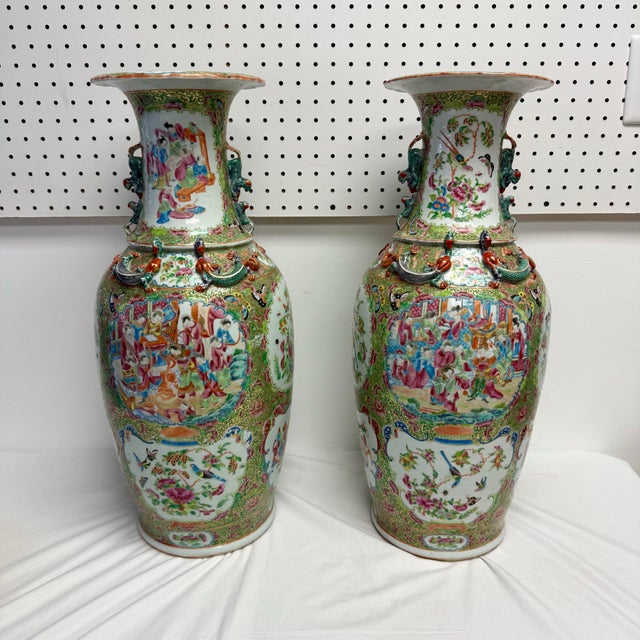 Pair of grand antique circa 1860 Chinese Qing Dynasty hand-painted porcelain Rose Medallion vases. Fantastic hand-painted...