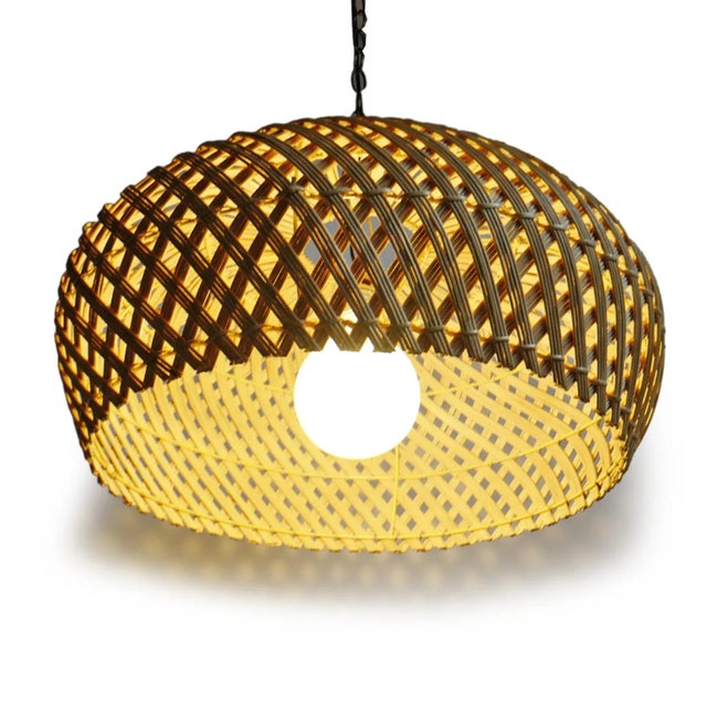 Hand woven rattan dome pendant with beautiful swirling weave pattern. Includes 3' of black hanging chain and ceiling...