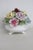 This gorgeous Floral Posy is made of bone china. This darling collectible is marked on the bottom with the following...