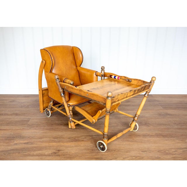 An exceedingly charming, interesting and rare metamorphic children's highchair-cum-push-along-buggy in wonderful antique...