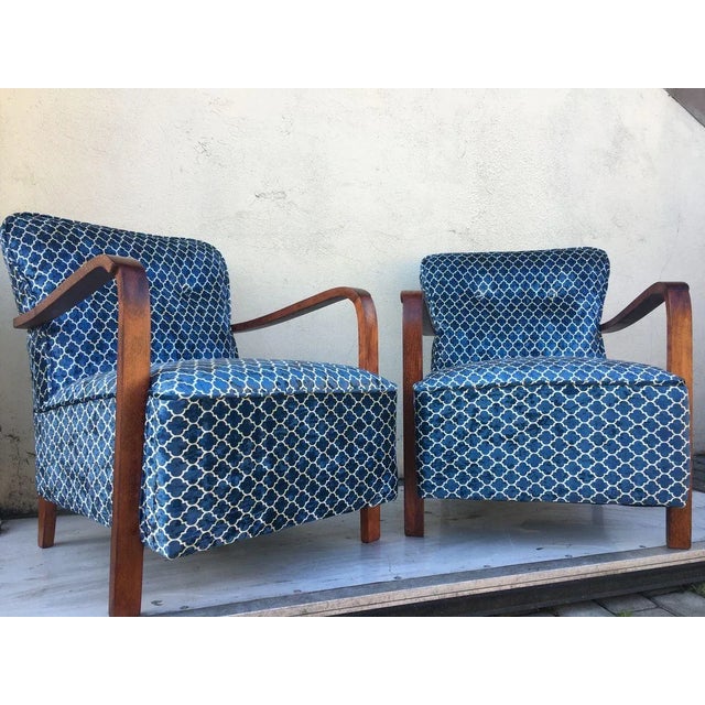 A beautiful set of two vintage 1940s armchairs. The structure is made of solid wood restored. The new, very good quality...