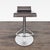 The Ligne Roset Pam bar stools are walnut stained oak and the base is chrome. The stool was designed by Claudio Dondoli...