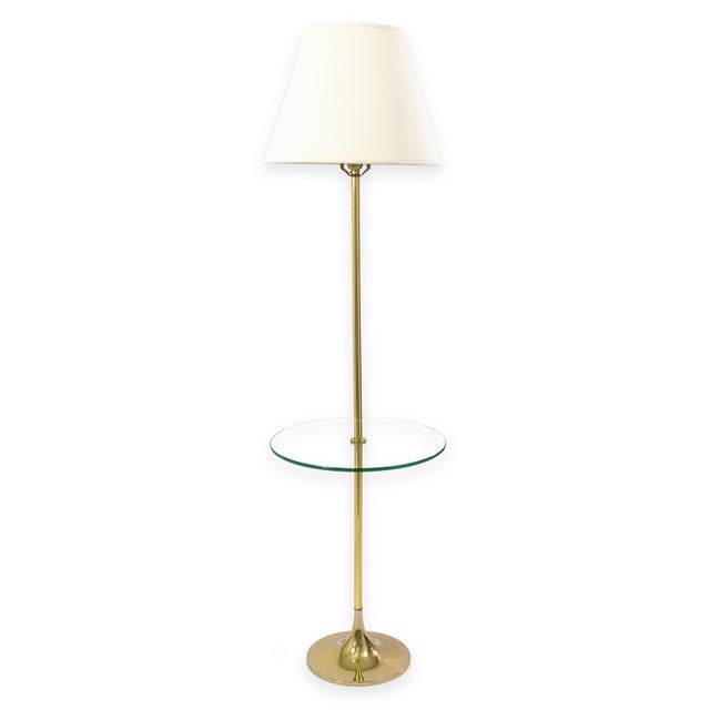 A vintage Laurel Lamp Company brass and glass lamp table. This lovely mid century modern lamp table features a classic...
