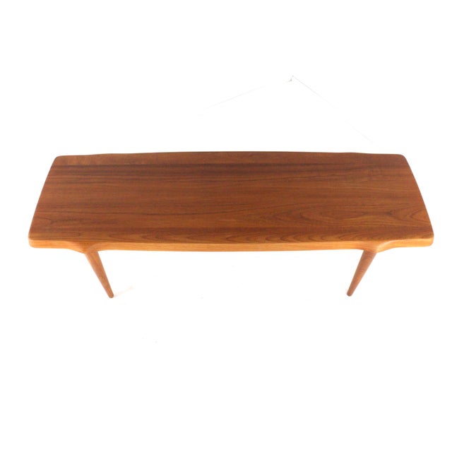A truly special Danish coffee table for true connoisseurs! This rectangular coffee table boasts a beautiful design and a...