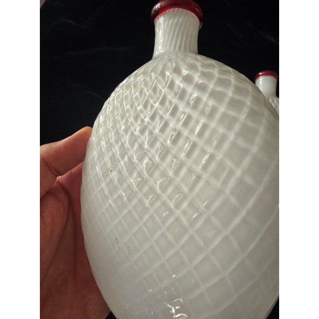 A rare vintage pair of mid century modern era or older murano style bottles . Having a very unusual waffle honeycomb...