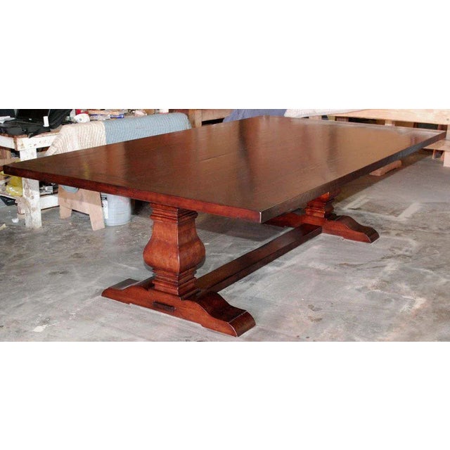 This massive dining or banquet table is made in solid, distressed cherrywood - the top is two inches thick! This table is...