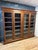 Beautiful large antique bookcase / display cabinet in walnut. In good condition throughout. Lovely warm color. The doors...