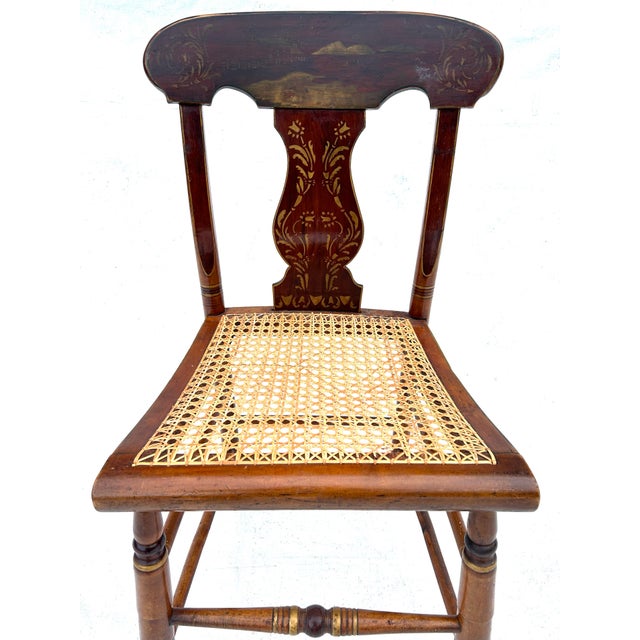 Antique side chair with new caning in seat cushion area. Excellent side chair with unusual turn-of-the-century stencil...