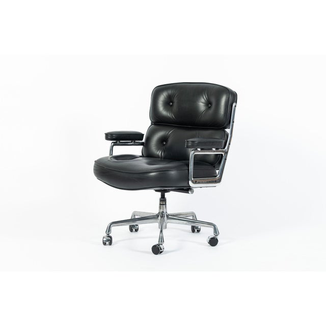 This black Model 3475 Eames Time Life Executive Lobby Chair designed by Charles & Ray Eames for Herman Miller was produced...