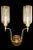 Anglo style two arm sconce with straight shade, brass fitter carved back plate.