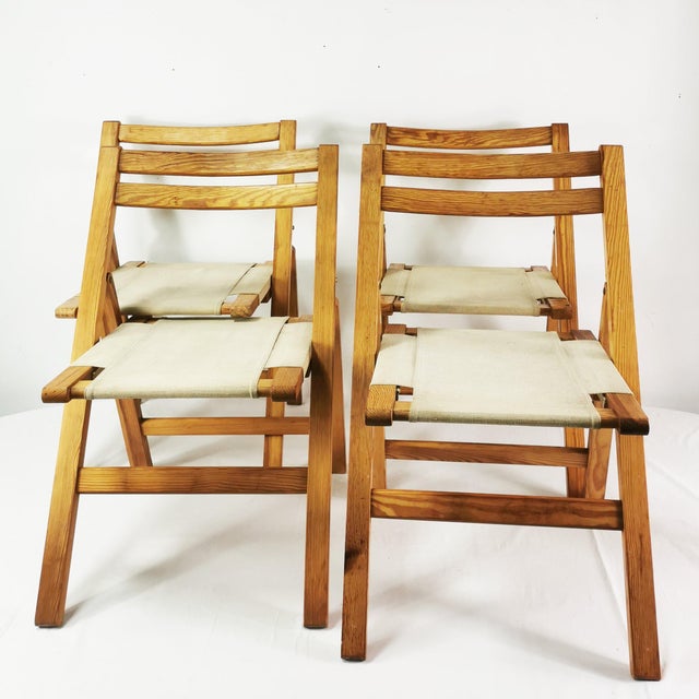 Set of 4 folding chairs from Biała Podlaska Furniture Factory, 1970s. They are characterized by a spacious, foldable form,...