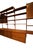 A whole wall of danish design, warm teak and thoughtful possibilities! this generous shelving system by poul cadovius for...