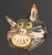 A 1970s ceramic tile by the American artist Mark Bulwinkle (born 1946). This ceramic piece depicts the face of a black cat...