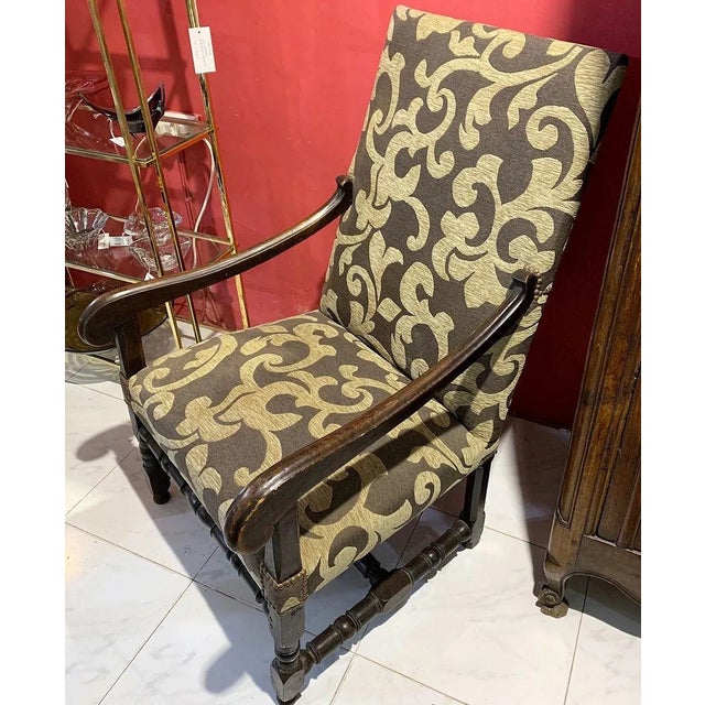 Sillon Louis XIII of French origin in walnut and reupholstered.