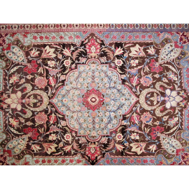 This master piece is a wool pile genuine hand woven antique Persian Tabriz carpet in excellent condition. Made in the 1900s.