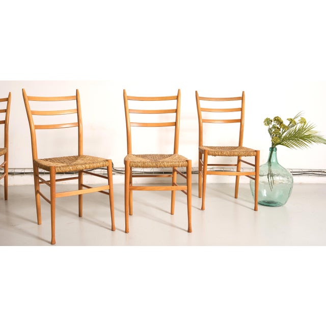 Timeless design for this set of 4 vintage Italian designer Otto Gerdau chairs, Scandinavian vintage style, dating from the...