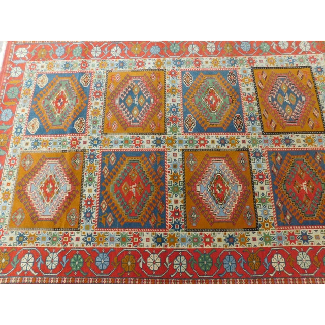 Mid century Persian vintage rug with wool pile on cotton foundation. Add a touch of nomadic style to your home with this...