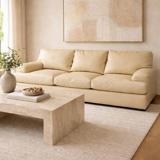 Vintage three-seat leather sofa designed and manufactured in Los Angeles, California by A. Rudin for Steve Chase. This...