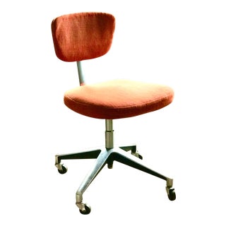1960's Modern Orange Rolling Office Chair For Sale
