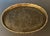 1960s Chinese figural brass tray, oval with a scalloped rim. Marked "MADE IN CHINA" on the back.