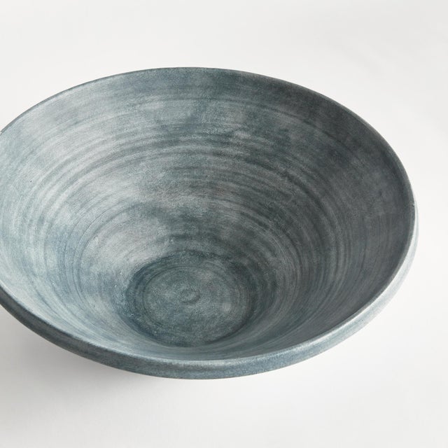 Hand thrown and perfectly imperfect, this terracotta bowl brings the character. With subtle horizontal ribbing that shows...