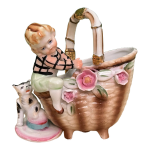 Vintage Porcelain Figurine of Boy Climbing on Basket