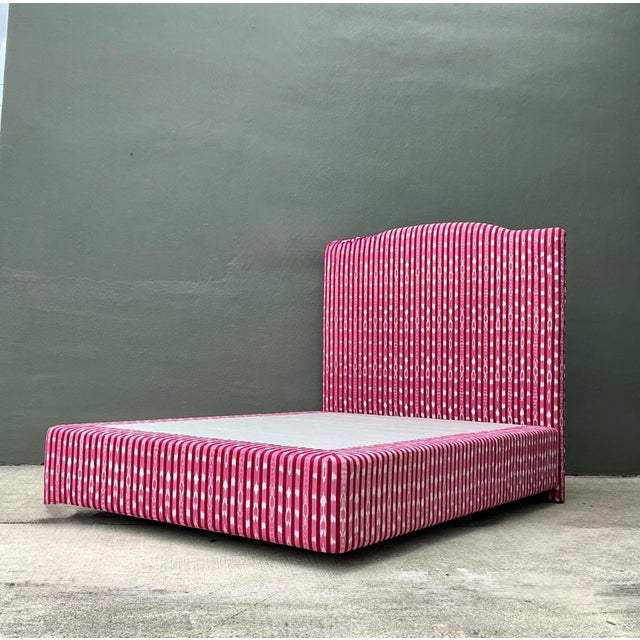 This vintage custom queen platform bed is a refined statement piece, expertly crafted from solid wood and upholstered in...