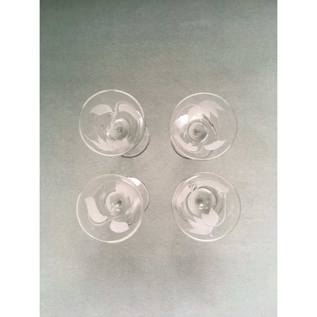 A charming set of etched stemmed liqueur glasses in excellent condition.