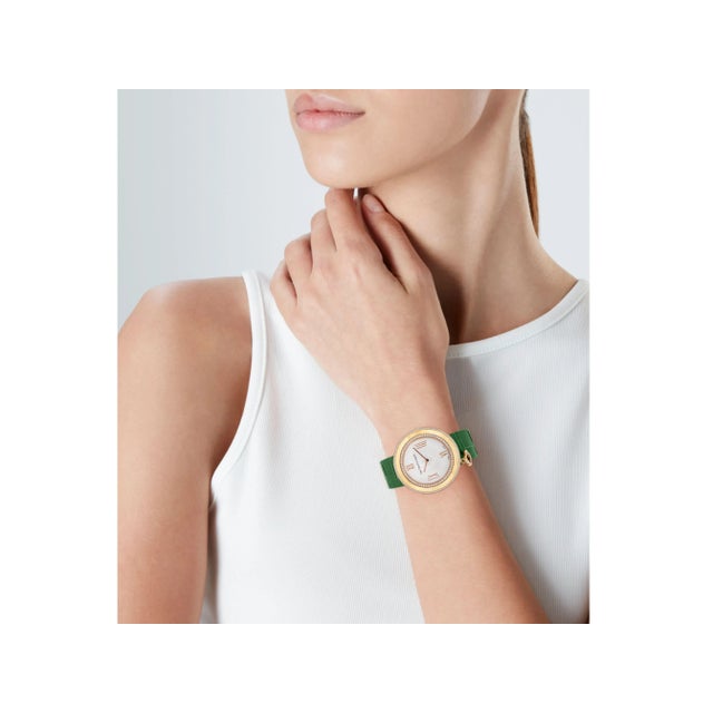 Van Cleef & Arpels Diamond Charms 38mm Women's Watch in 18K Rose Gold With Green Leather Strap. Complete with box and...