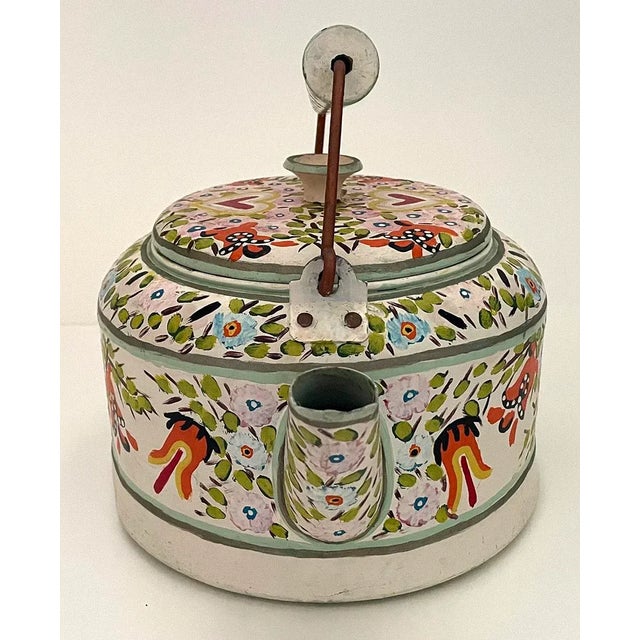 Large aluminum tea pot which has been hand painted by Utah artist Joseph Hanlon during the depression. The artist sold...