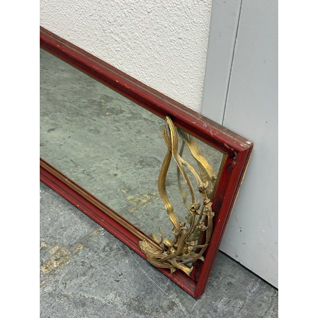 Design Plus Gallery presents a Vintage Asian-Inspired Red + Gilt Botanical Wall Mirror. The rectangular wood frame has a...