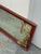 Design Plus Gallery presents a Vintage Asian-Inspired Red + Gilt Botanical Wall Mirror. The rectangular wood frame has a...