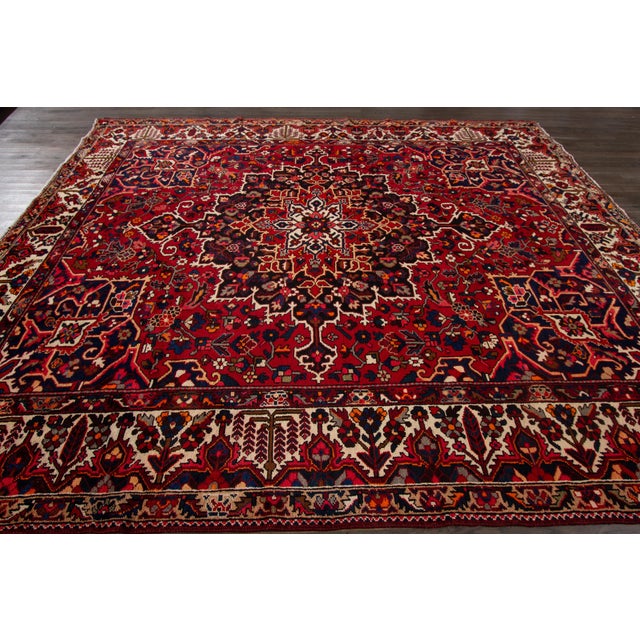Persian 1950s Red Bakhtiari Handmade Wool Rug Featuring an All-Over Design For Sale - Image 3 of 6