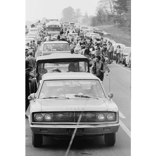 Woodstock Traffic Jam Festival-goers abandon their vehicles in a traffic jam on the way to the Woodstock Music Festival,...