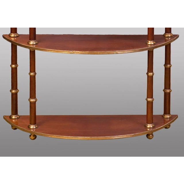 This pair of hanging shelves is decorated with metal applications. They were produced in the Baltic countries during the...