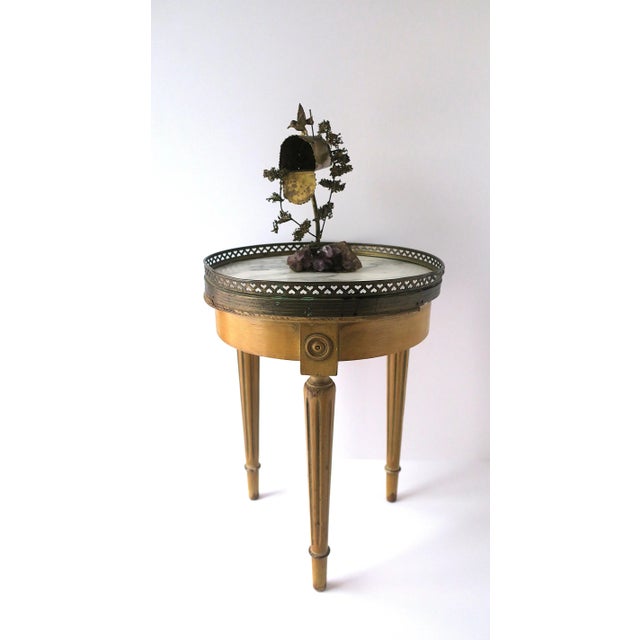 A beautiful one-of-a-kind hand-crafted brass Hummingbird and amethyst sculpture piece, in the design style of designer...