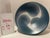 Large wheel-thrown studio pottery bowl, signed "Hughes" on the base, c. 1980s. A bold three-part swirl in the cream clay...