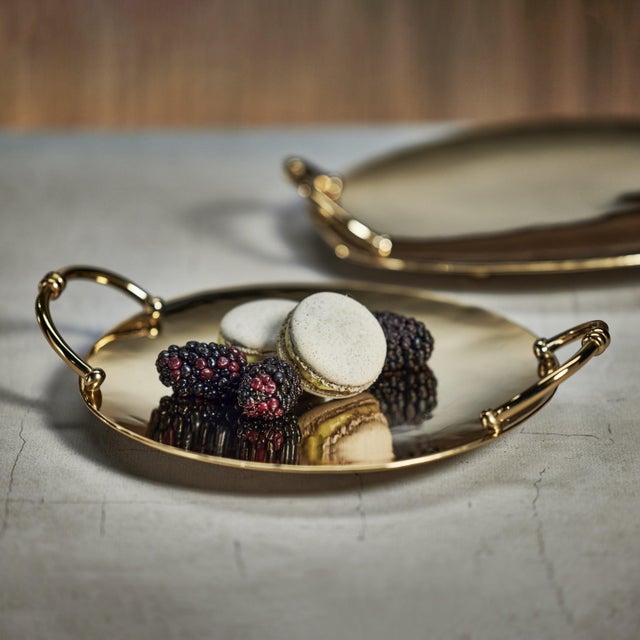 The Azalea Round Serving Tray is the perfect size for serving small treats. The beautiful lustrous gold tone will bring...