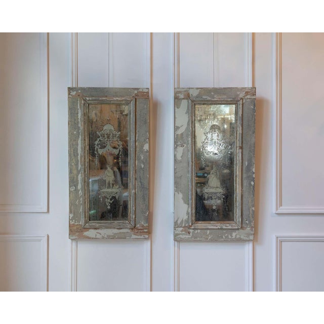 A superb pair of 19th-century Italian mirrors, each featuring finely engraved mirror plates set within their original...