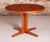 Danish Mid Century extending teak dining table, circa 1970s. The table comes with 2 extension leaves, extends to 208cm to...