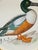Hand-painted with high-quality acrylics and natural pigments, this beautiful mallard comes to life through delicate,...