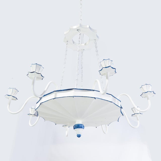 This exquisite handmade iron pendant chandelier features a unique, structural silhouette that blends vintage charm with a...