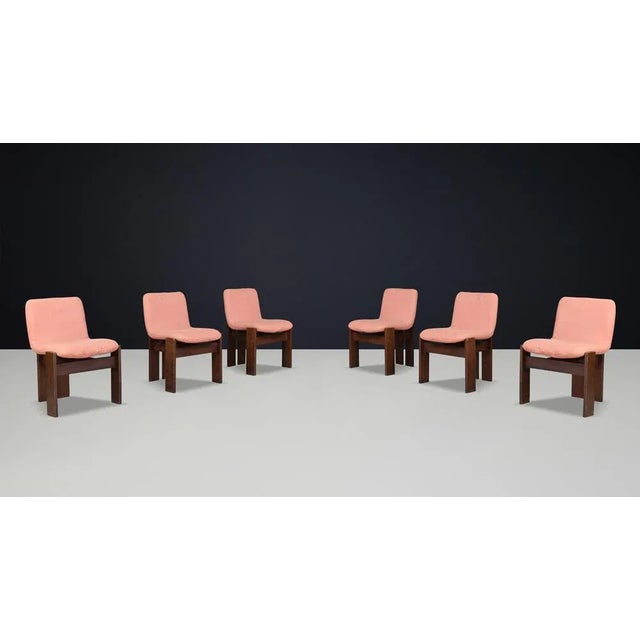 This distinguished set of six Italian dining room chairs, crafted in the 1960s, beautifully embodies the harmonious blend...