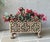 Note: Faux flowers are not included. Exquisite cast iron jardinière/planter which we believe was made in France in the...