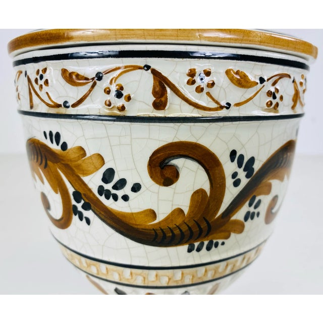 This is a mid century vintage hand painted pottery urn with lid. This hand-painted classical Italian urn Has beautiful...