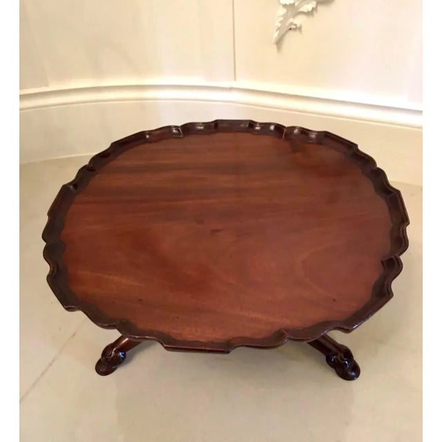Antique 19th century Victorian Lazy Susan having a lovely revolving mahogany shaped top with pie crust edge. It is raised...