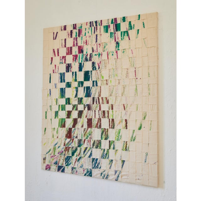 Created by biking through a puddle of paint and over a long canvas. This was then ripped in half, with one side being...