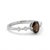 This elegant ring features a captivating oval-cut smoky quartz gemstone, renowned for its rich, warm brownish-gray hue and...