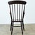 A handsome mid-19th century English Windsor chair built from solid elm and ash. This attractive chair has a high back with...
