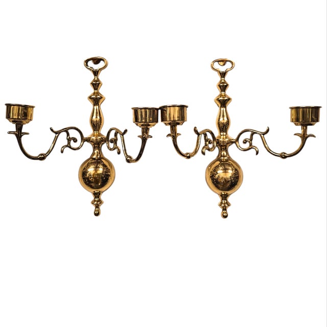 Enhance your space with a pair of vintage Ethan Allen brass wall sconces. These 12.625-inch candleholders offer timeless...